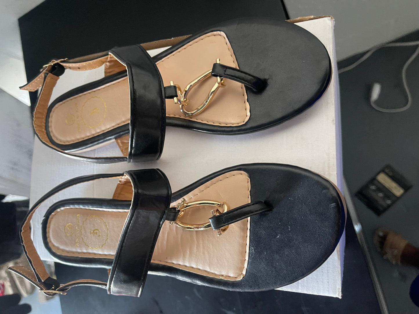 Black Flat Sandals with Ankle Strap and Gold-Tone O-Ring Detail